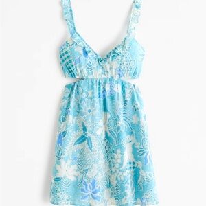 Ruffle Cut-out Mini Dress.